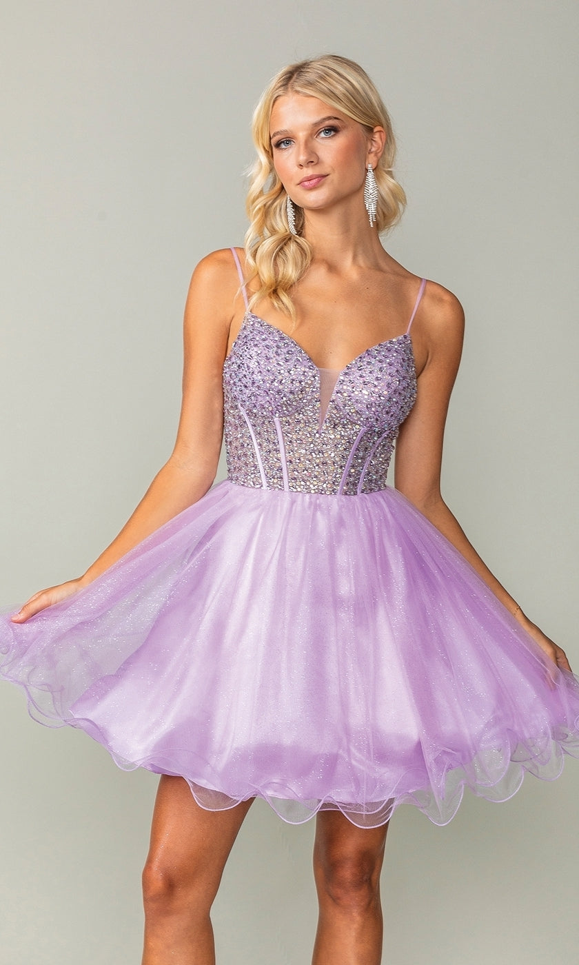 A woman models the Beaded Corset Short A-Line Homecoming Dress 3353 in lilac, featuring a beaded corset bodice and flared tulle skirt, standing against a plain background.